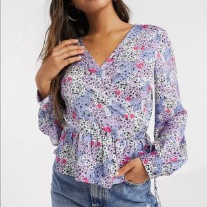 Vero Moda wrap blouse with peplum hem in blue floral